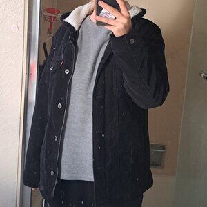 Black hooded corduroy levi's jacket.